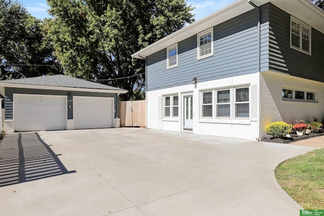 view of side of home with a garage