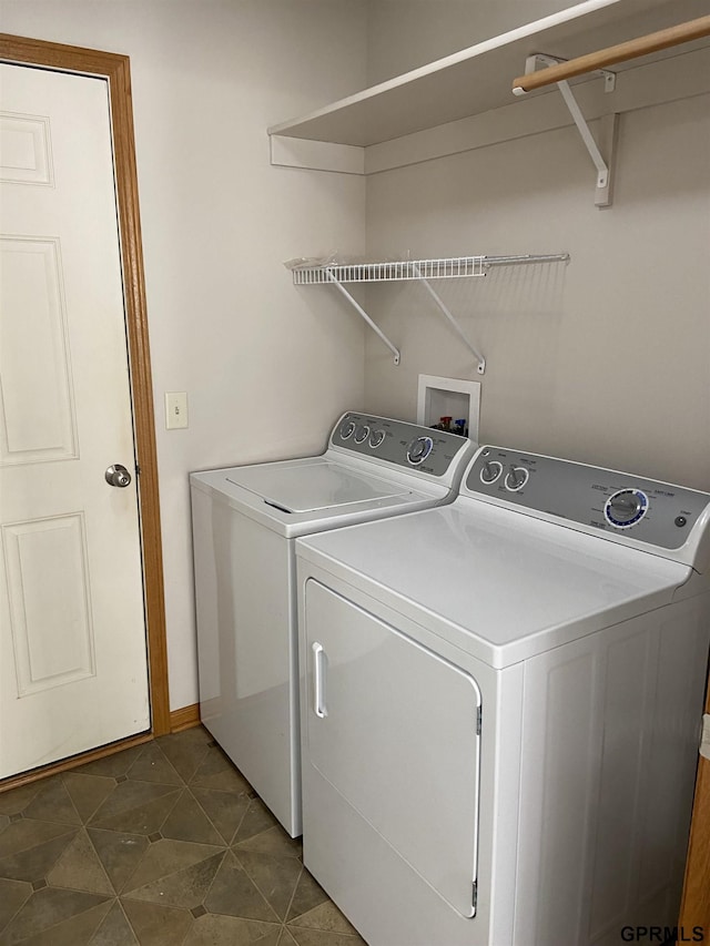 washroom featuring separate washer and dryer