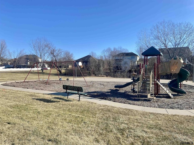 view of jungle gym with a lawn