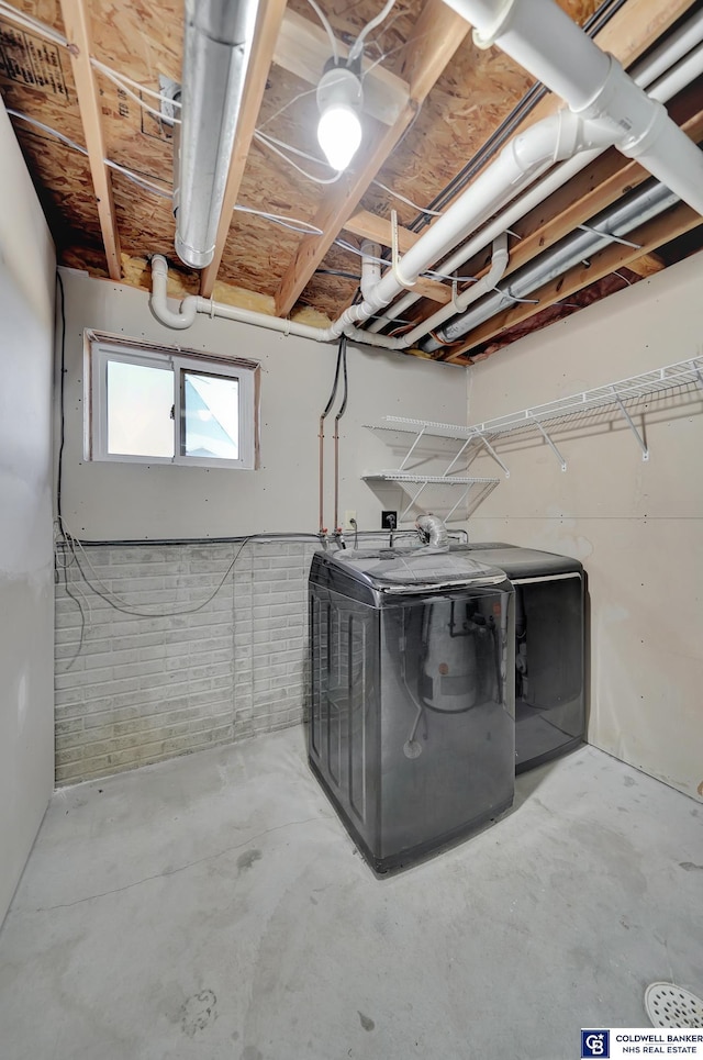 laundry area with washing machine and clothes dryer