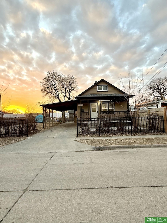 view of front of house with a carport