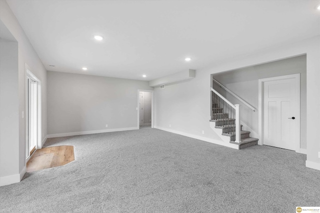 basement featuring carpet flooring