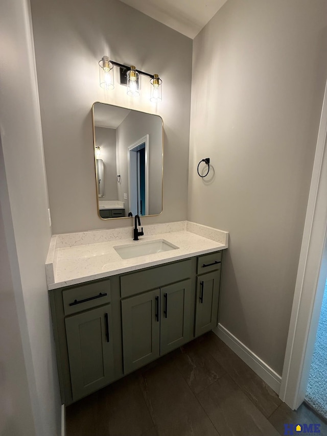 bathroom featuring tile patterned floors and vanity