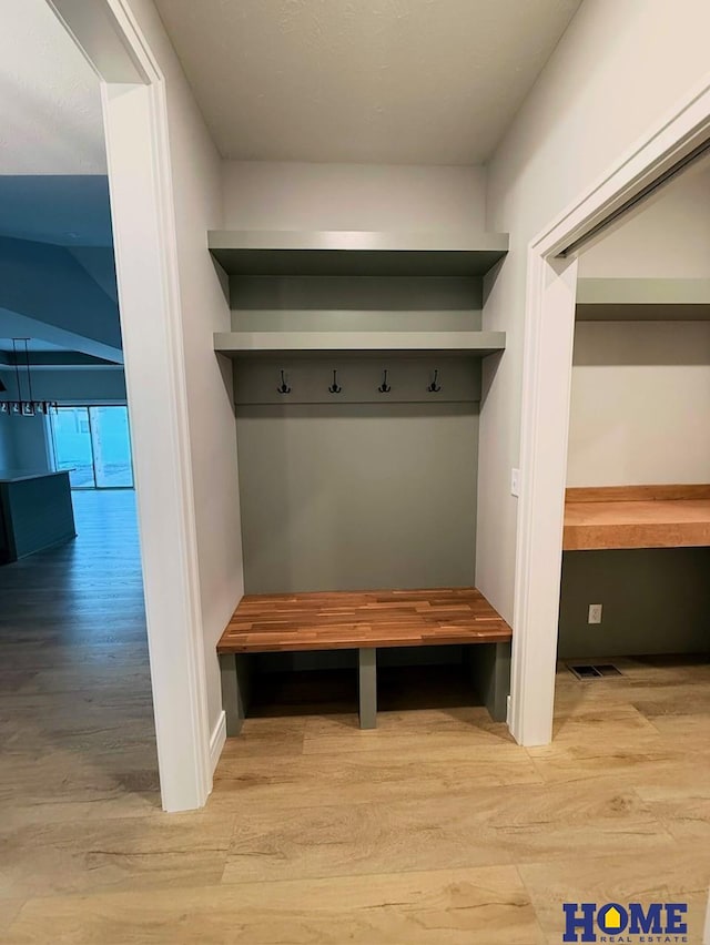 mudroom featuring hardwood / wood-style floors