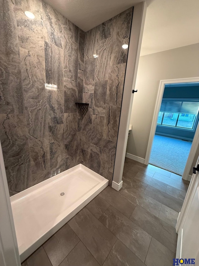 bathroom featuring walk in shower