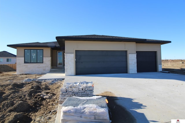 prairie-style house with a garage