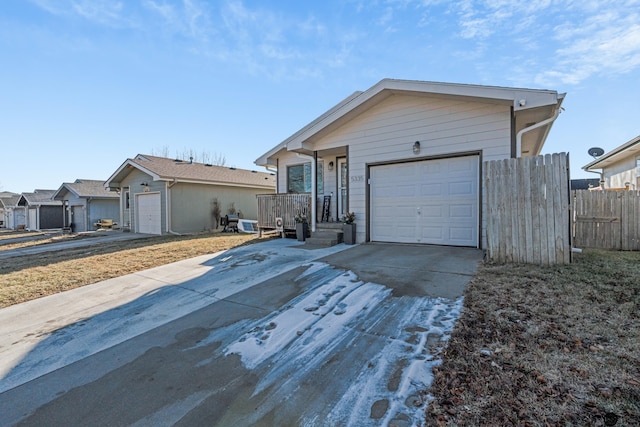 ranch-style home with a garage