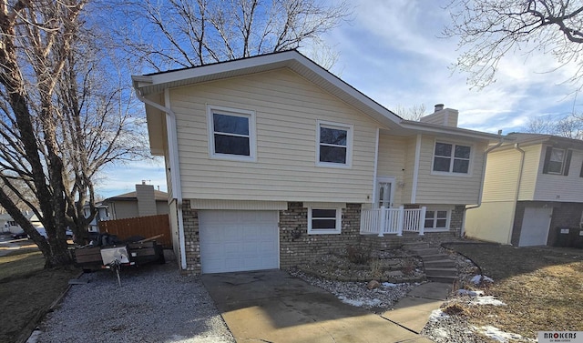 bi-level home featuring a garage