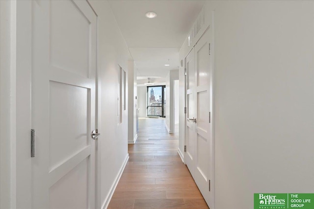 hall featuring light hardwood / wood-style floors