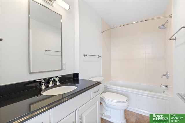 full bathroom featuring toilet, tile patterned flooring, tiled shower / bath combo, and vanity