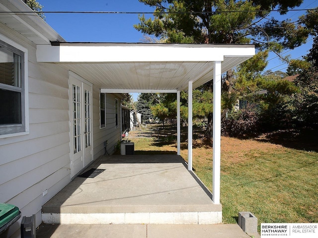 view of car parking with a yard