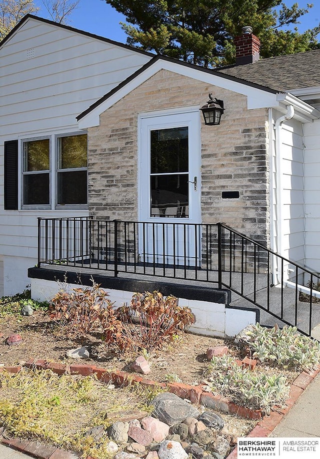 doorway to property featuring covered porch