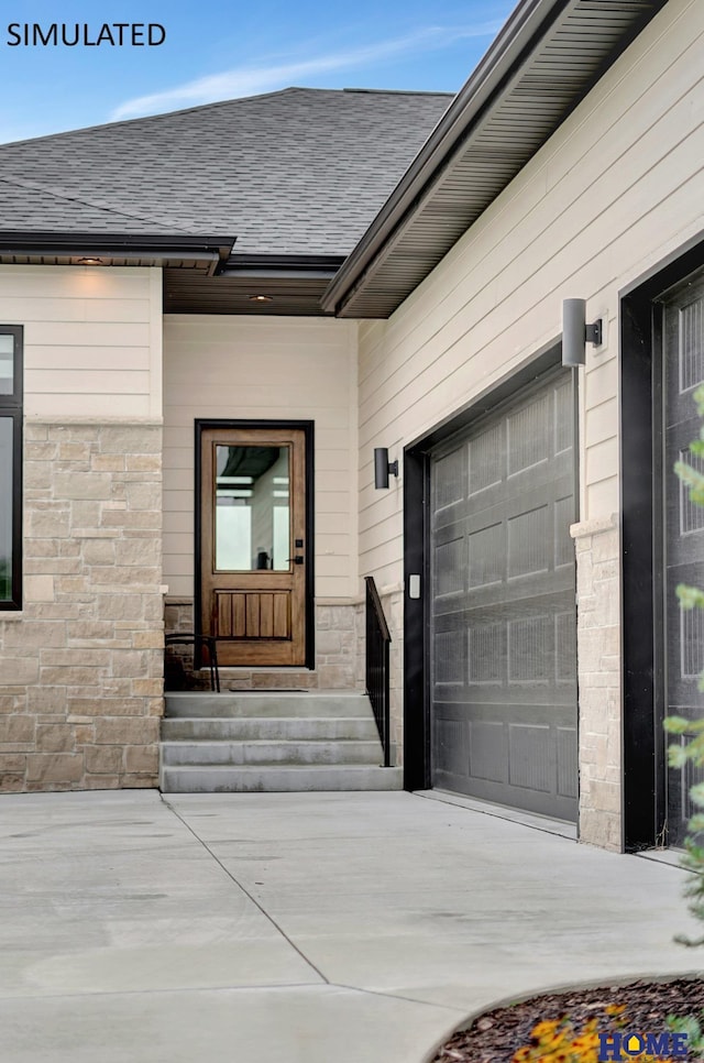 doorway to property featuring a garage