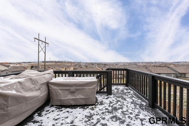 view of snow covered deck