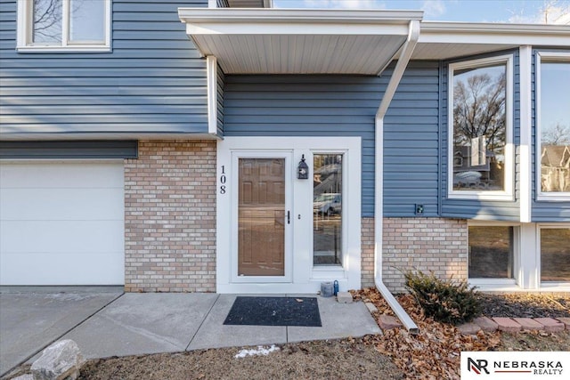 entrance to property with a garage