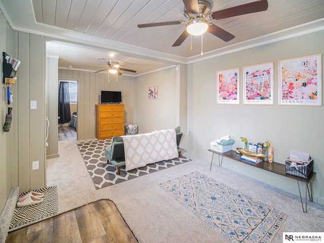 living room featuring wood-type flooring, wooden ceiling, and beamed ceiling