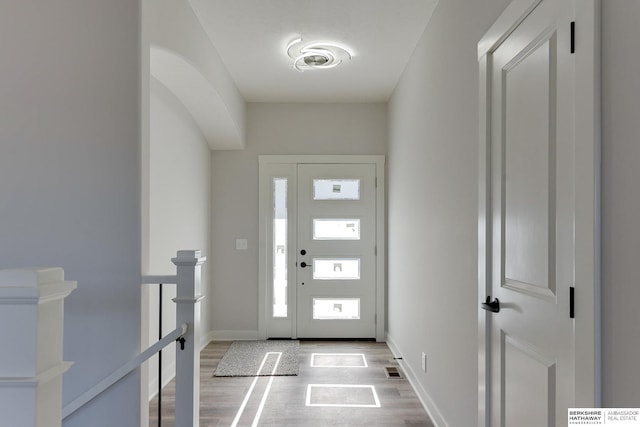 foyer with light wood-type flooring