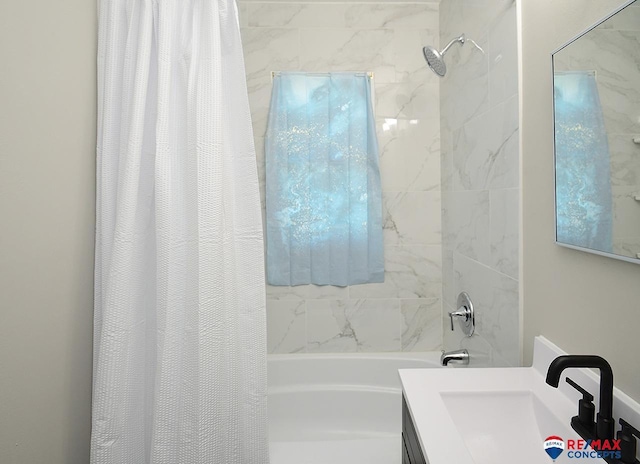 bathroom with sink and shower / tub combo with curtain