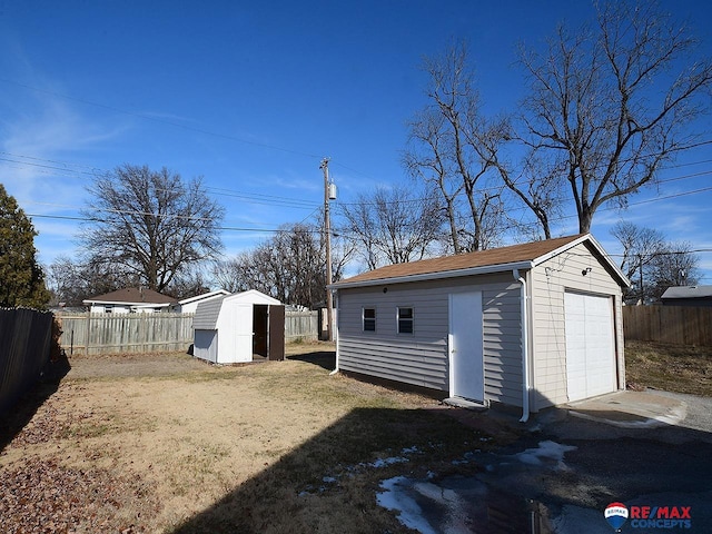 garage with a yard