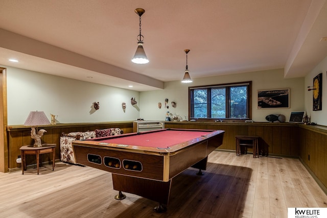 game room featuring beverage cooler, pool table, and light hardwood / wood-style flooring