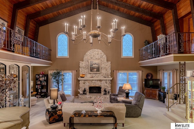 living room with light carpet, a fireplace, a chandelier, high vaulted ceiling, and beam ceiling