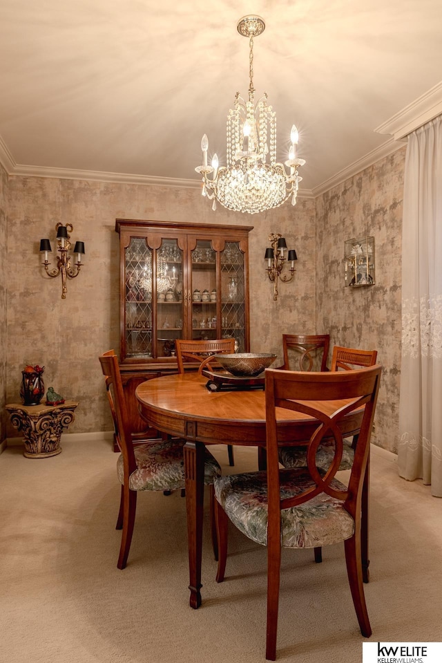 carpeted dining area featuring crown molding and a notable chandelier