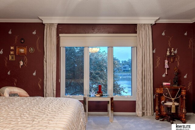 bedroom with carpet flooring, ornamental molding, and multiple windows