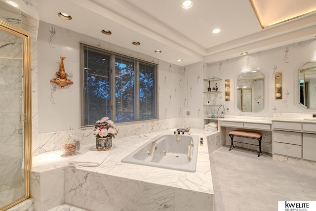 bathroom with vanity and separate shower and tub