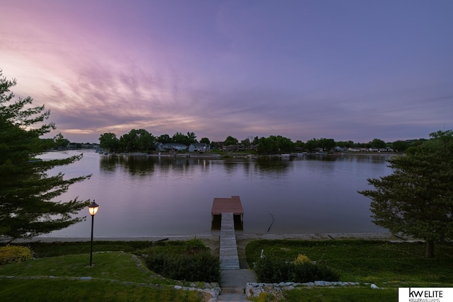 dock area featuring a water view