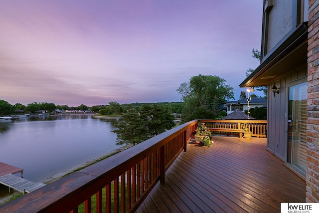 deck at dusk with a water view