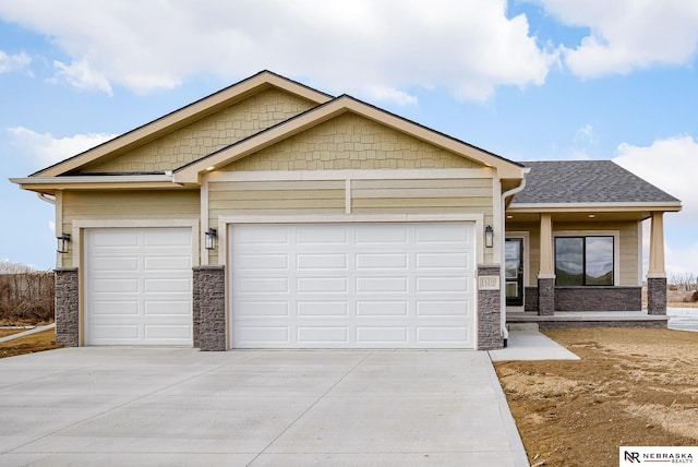 craftsman house with a garage