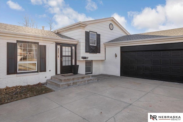 view of front of house with a garage