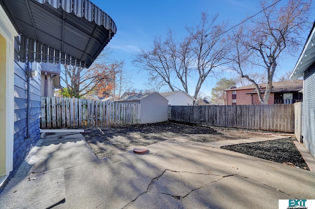 view of patio with a shed