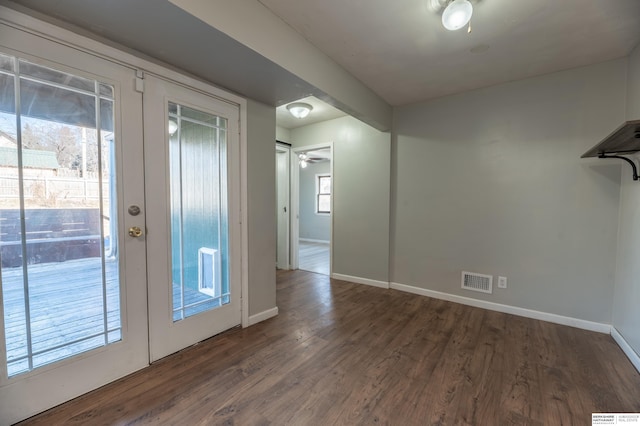 interior space featuring french doors and dark hardwood / wood-style flooring