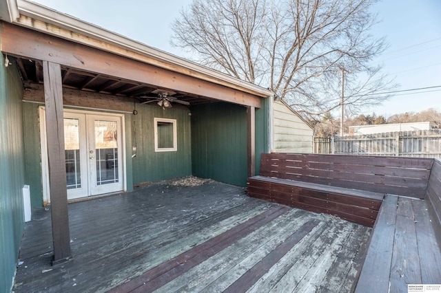 deck featuring ceiling fan and french doors