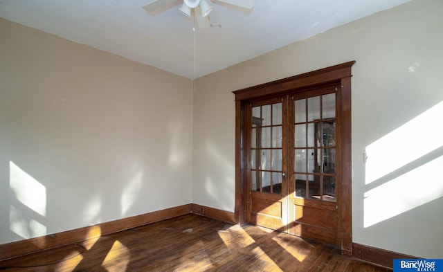 unfurnished room with ceiling fan and dark hardwood / wood-style floors