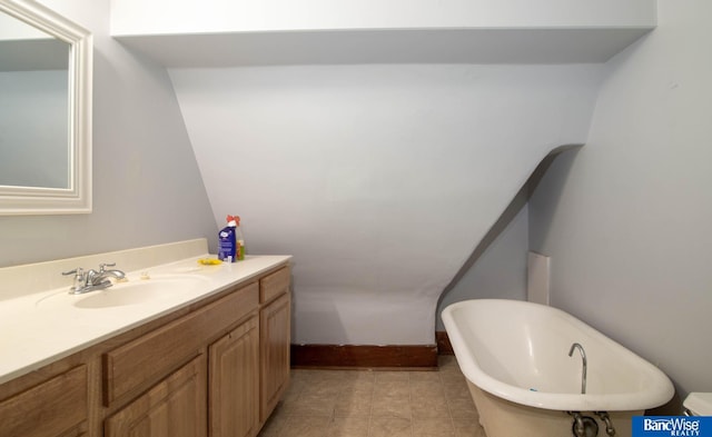 bathroom with vanity and a bathtub