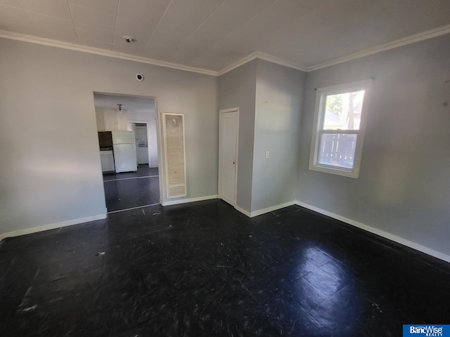 empty room featuring ornamental molding