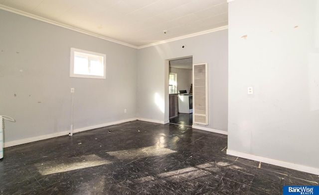 unfurnished room with ornamental molding