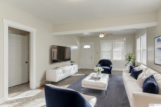 living room featuring ceiling fan