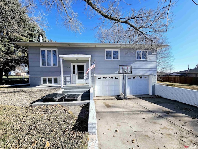 bi-level home featuring a garage