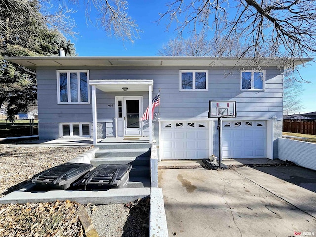 split foyer home featuring a garage