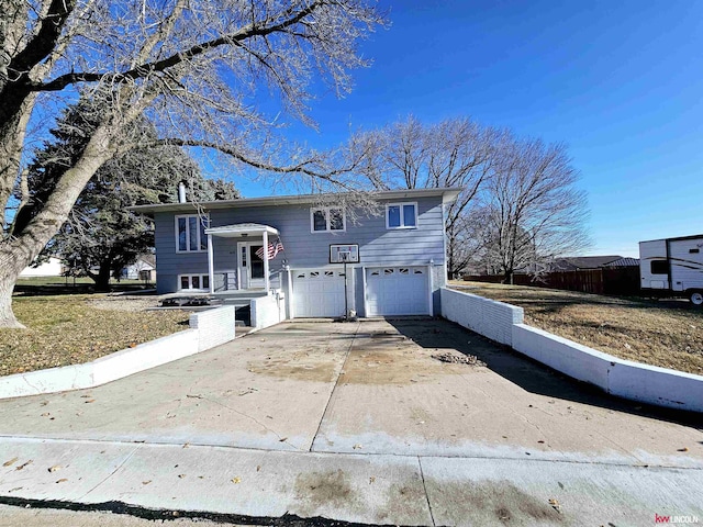 raised ranch featuring a garage