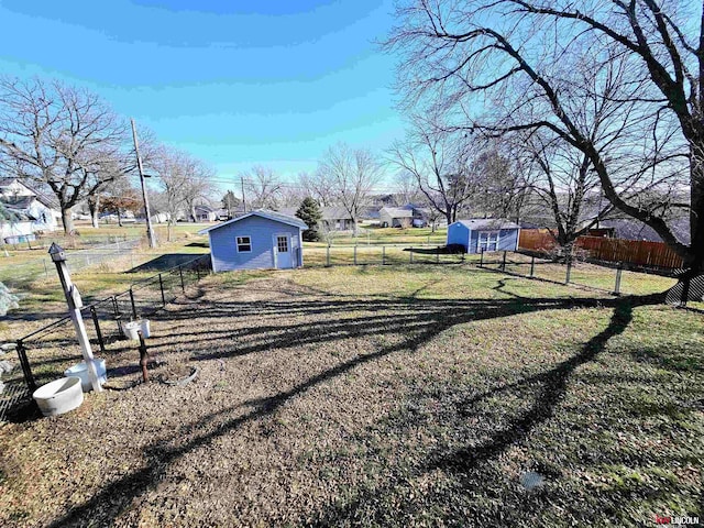 view of yard with a storage shed