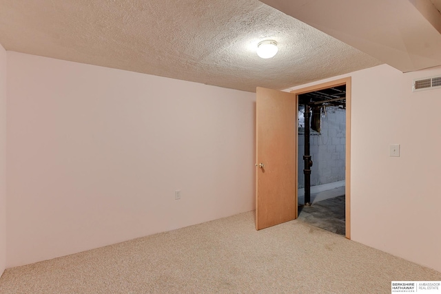 interior space featuring a textured ceiling