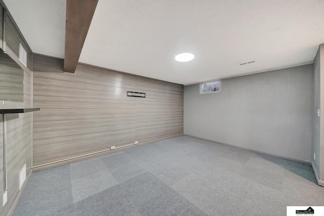 basement with light carpet