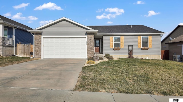 ranch-style home with a front yard, ac unit, and a garage