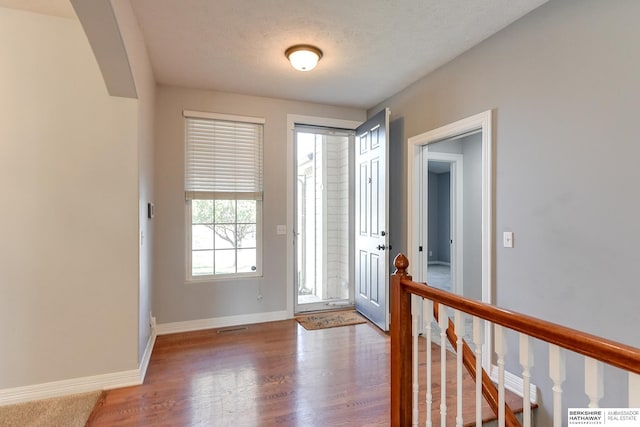 entryway featuring hardwood / wood-style flooring