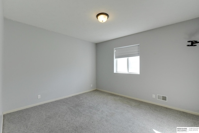 empty room featuring carpet floors