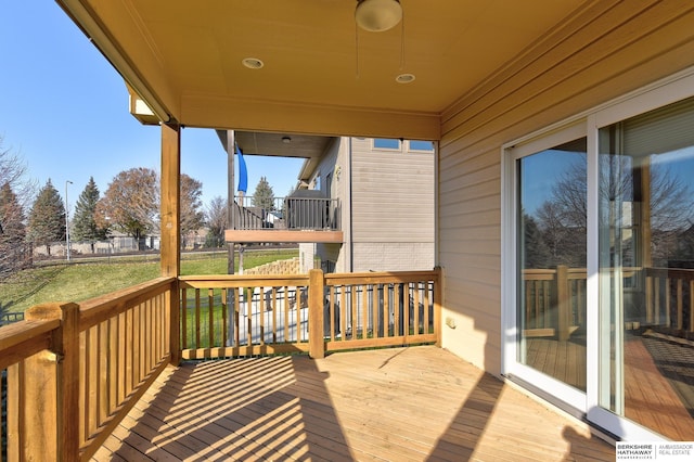 wooden terrace with ceiling fan